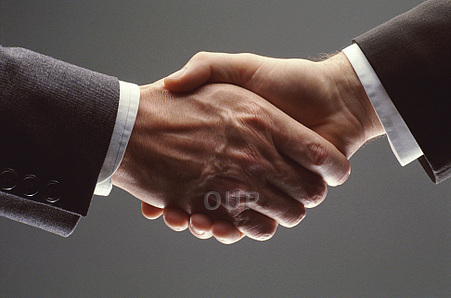 Close-up of a handshake