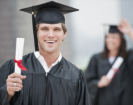 Male graduate student smiling