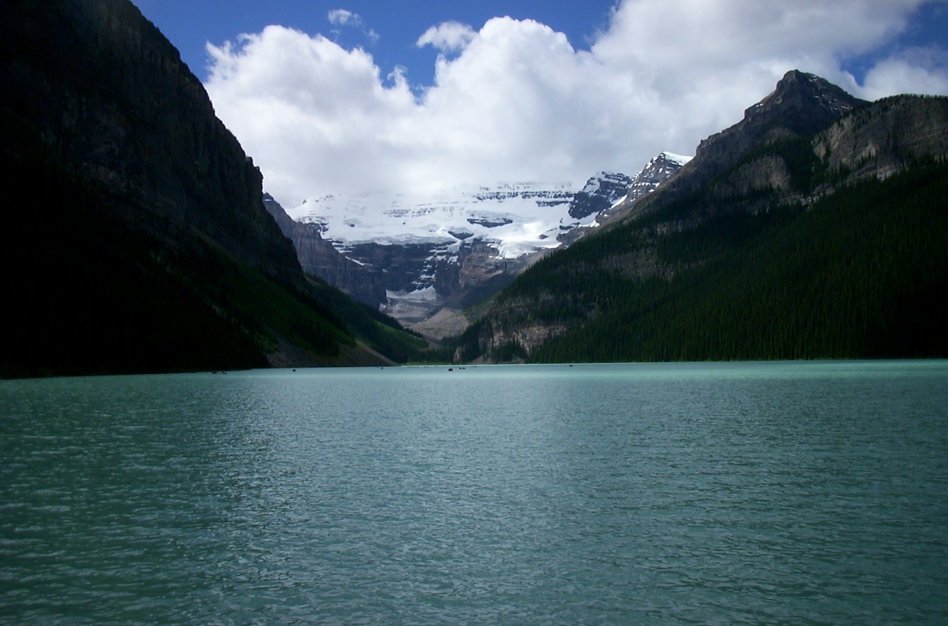 Open water by mountain range