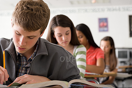 Teenage students in class