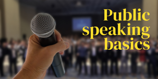 Hand holding microphone with a crowd n the background, including heading: public speaking basics